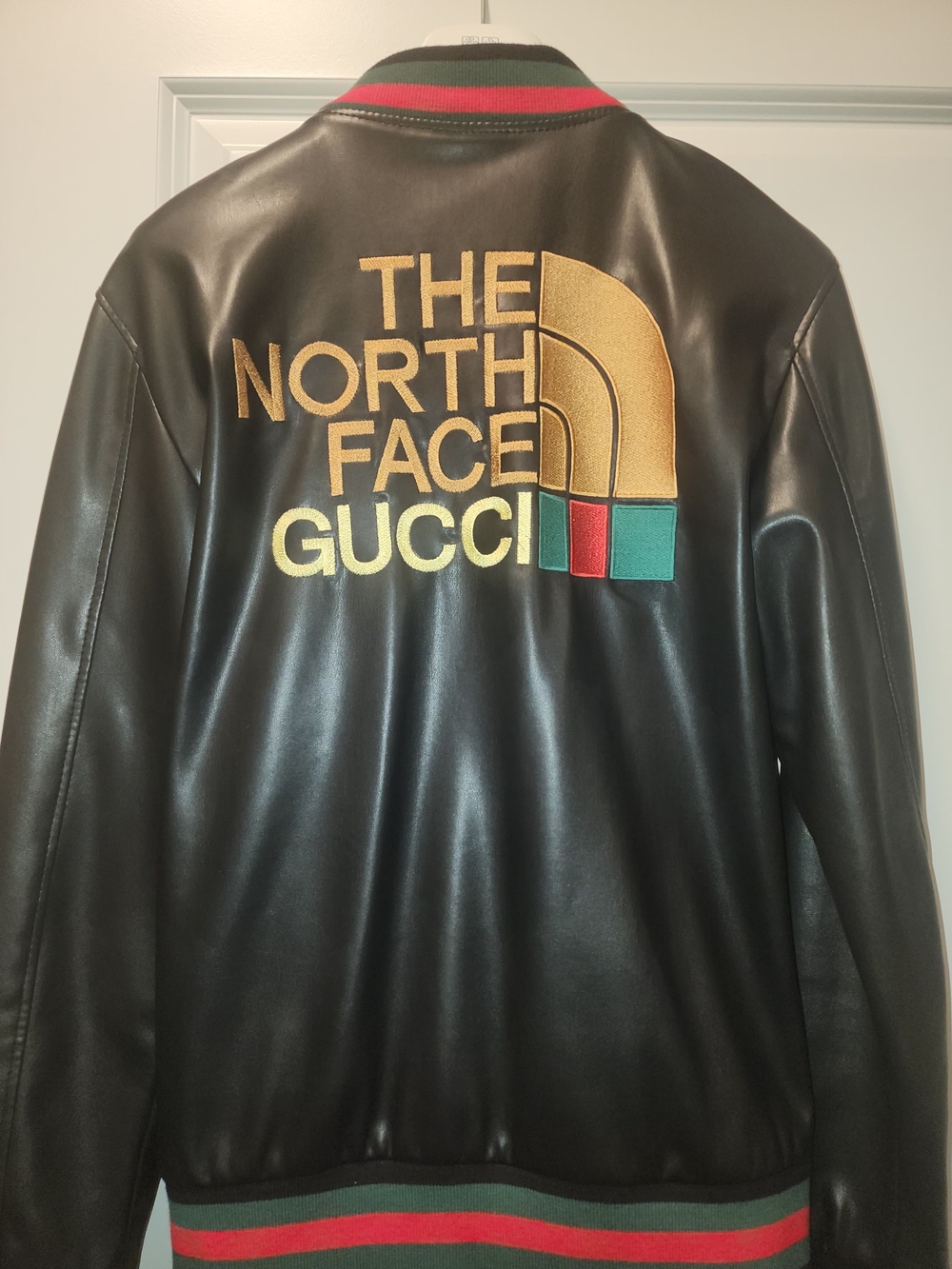 Gucci Black Leather Bomber Jacket with Gold Logo and Red-Green Trim